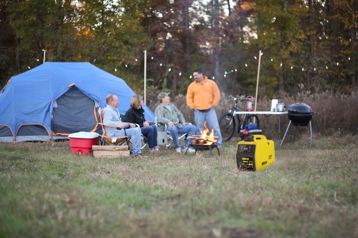 Generator powering camping trip outdoors.