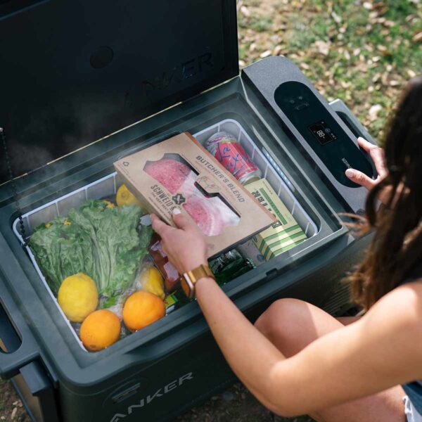 EverFrost-Powered-Cooler-30L-Lifestyle-person-using-fridge
